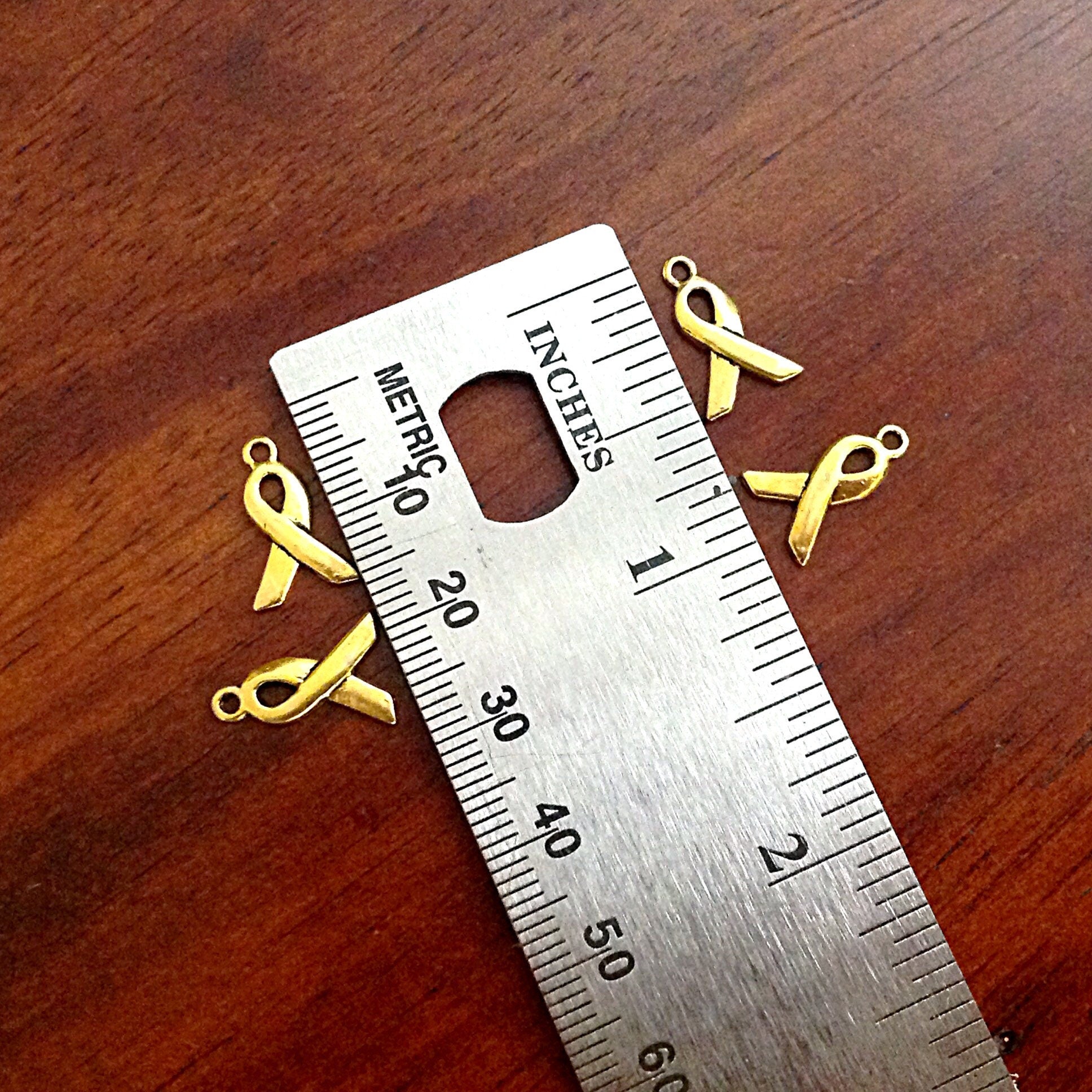 Bulk 50 Tiny Ribbon Charms, Antique Gold Charms, Ribbon Charms, Hope Ribbon Charms, Awareness Charms, Jewelry and Craft Supplies, Findings