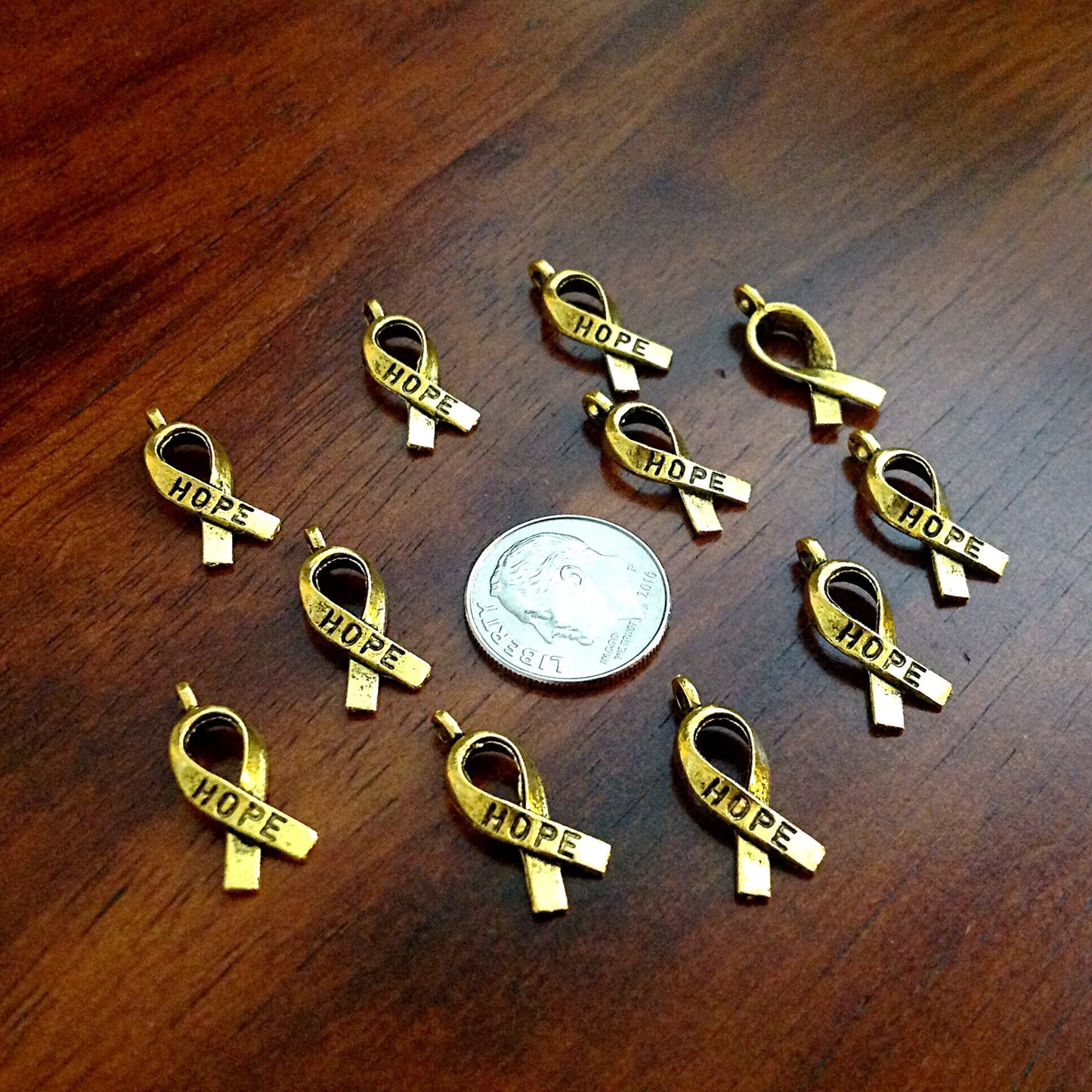 Bulk 50 Hope Ribbon Charms, Antique Gold Charms, Ribbon Charms, Hope Ribbon Charms, Awareness Charms, Jewelry and Craft Supplies, Findings