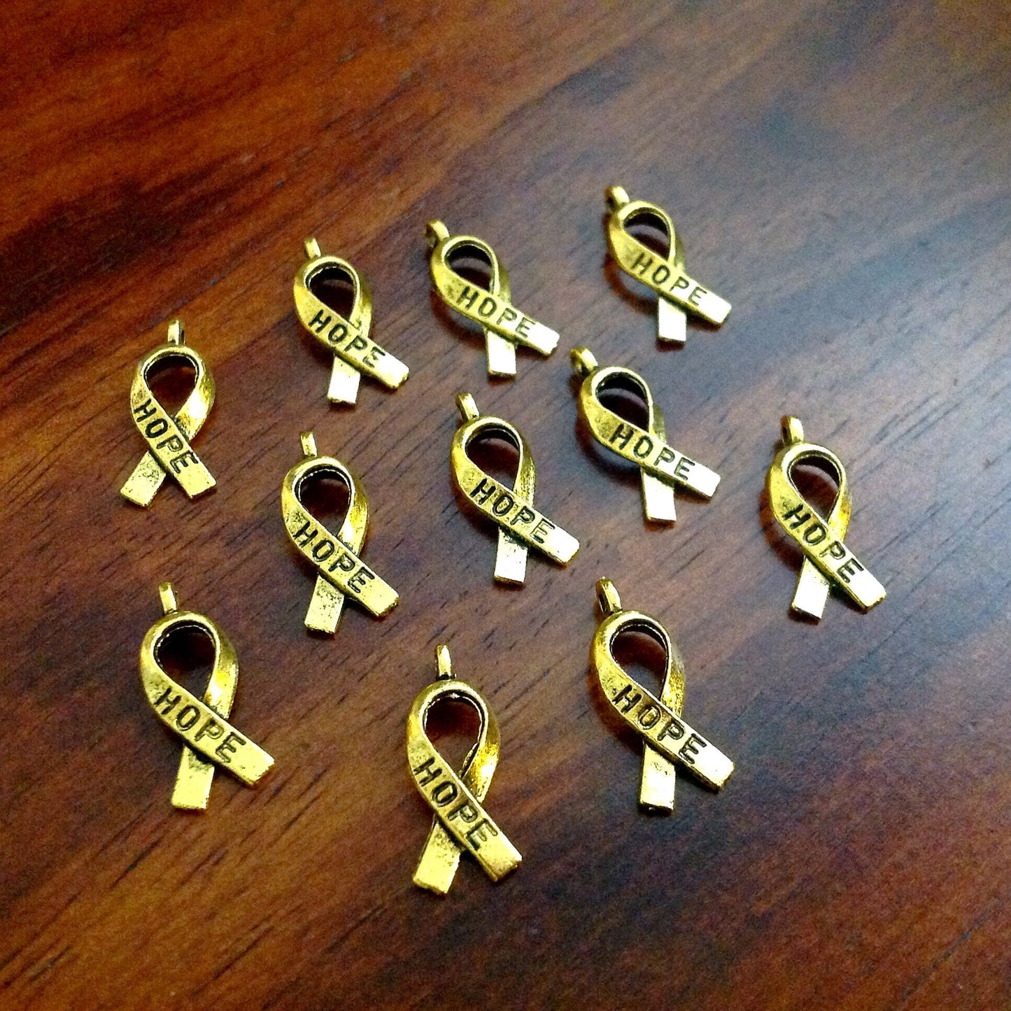 25pcs Hope Ribbon Charms, Antique Gold Charms, Ribbon Charms, Hope Ribbon Charms, Awareness Charms, Jewelry and Craft Supplies, Findings