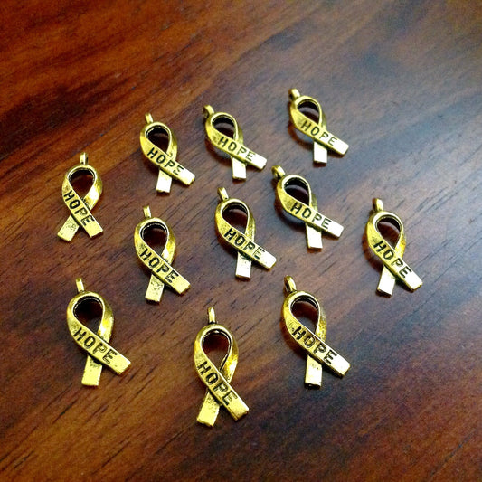 25pcs Hope Ribbon Charms, Antique Gold Charms, Ribbon Charms, Hope Ribbon Charms, Awareness Charms, Jewelry and Craft Supplies, Findings